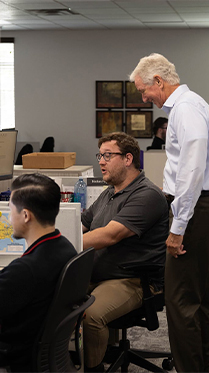 Team collaboration at Cornerstone Systems office in Memphis, TN